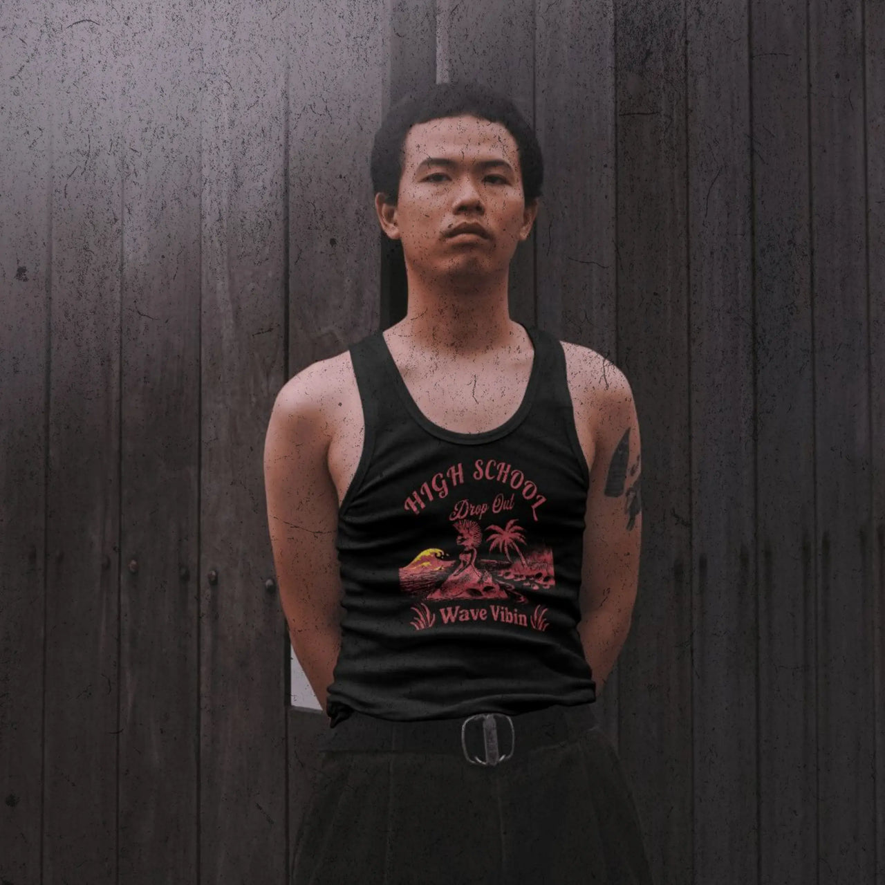 Young teen wearing a black HSDO tank top